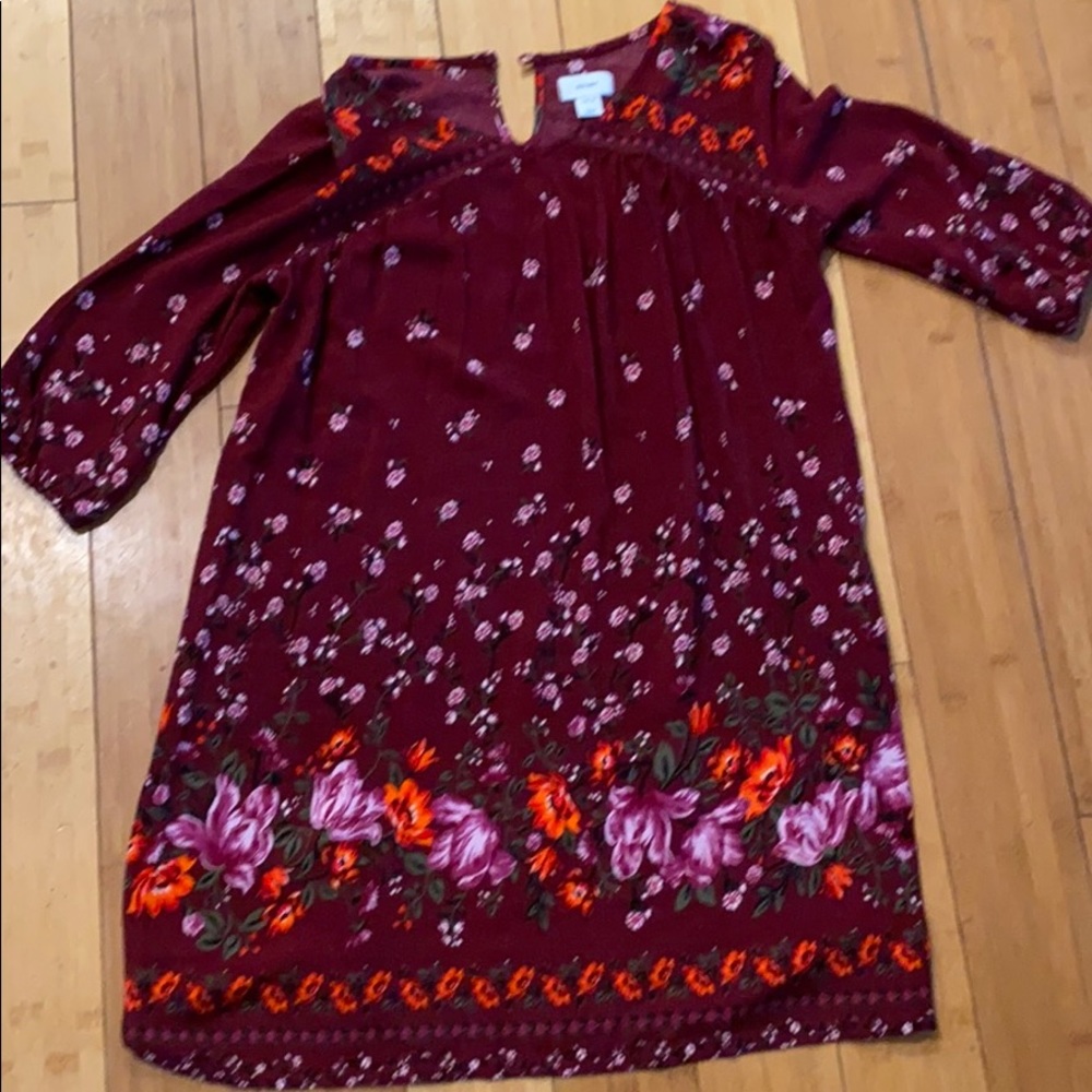Maroon dress with floral patterns